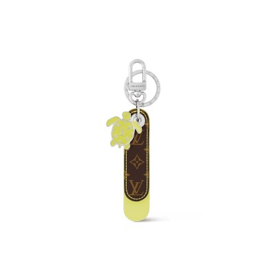 LOUIS VUITTON DRAGONNE TAB KEY HOLDER AND BAG CHARM M02567
